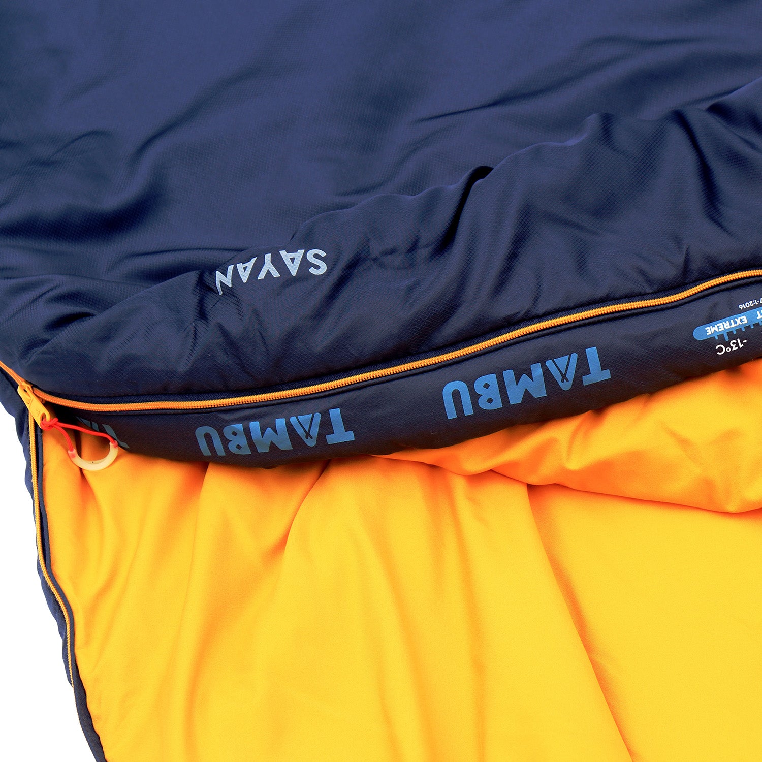 SAYAN Deckenschlafsack 1400 von Tambu Outdoor in dunkelblau mit gelbfarbenem Innenfutter und Reißverschluss, Detailansicht